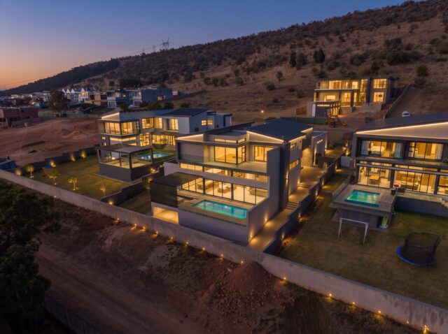 Sunset Boulevard, glowing at golden hour. ✨

Set high above the estate, this newly completed residence combines bold contemporary architecture with uninterrupted views, five en suite bedrooms and seamless indoor-outdoor living. 🌅

💰 Priced at R11,000,000.00

#EyeOfAfrica #Views #SunsetBoulevard #LuxuryLiving #UrbanTrend
